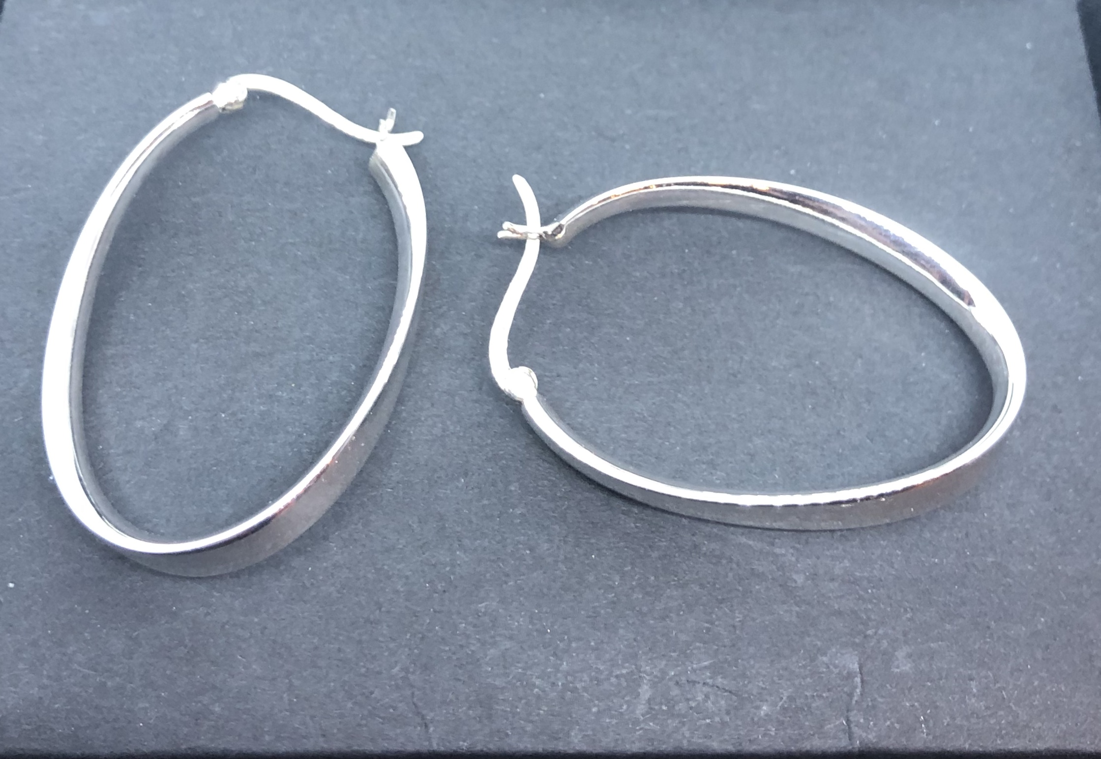 Sterling silver hoop oval twist earrings - Dimple\'s Imports